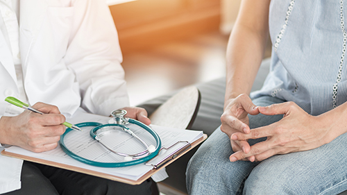 an image showing a women seeking medical consultation