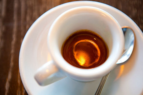 portraying caffeinated beverage a strong coffee