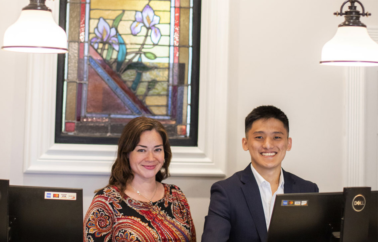 front desk staff welcomes our guests