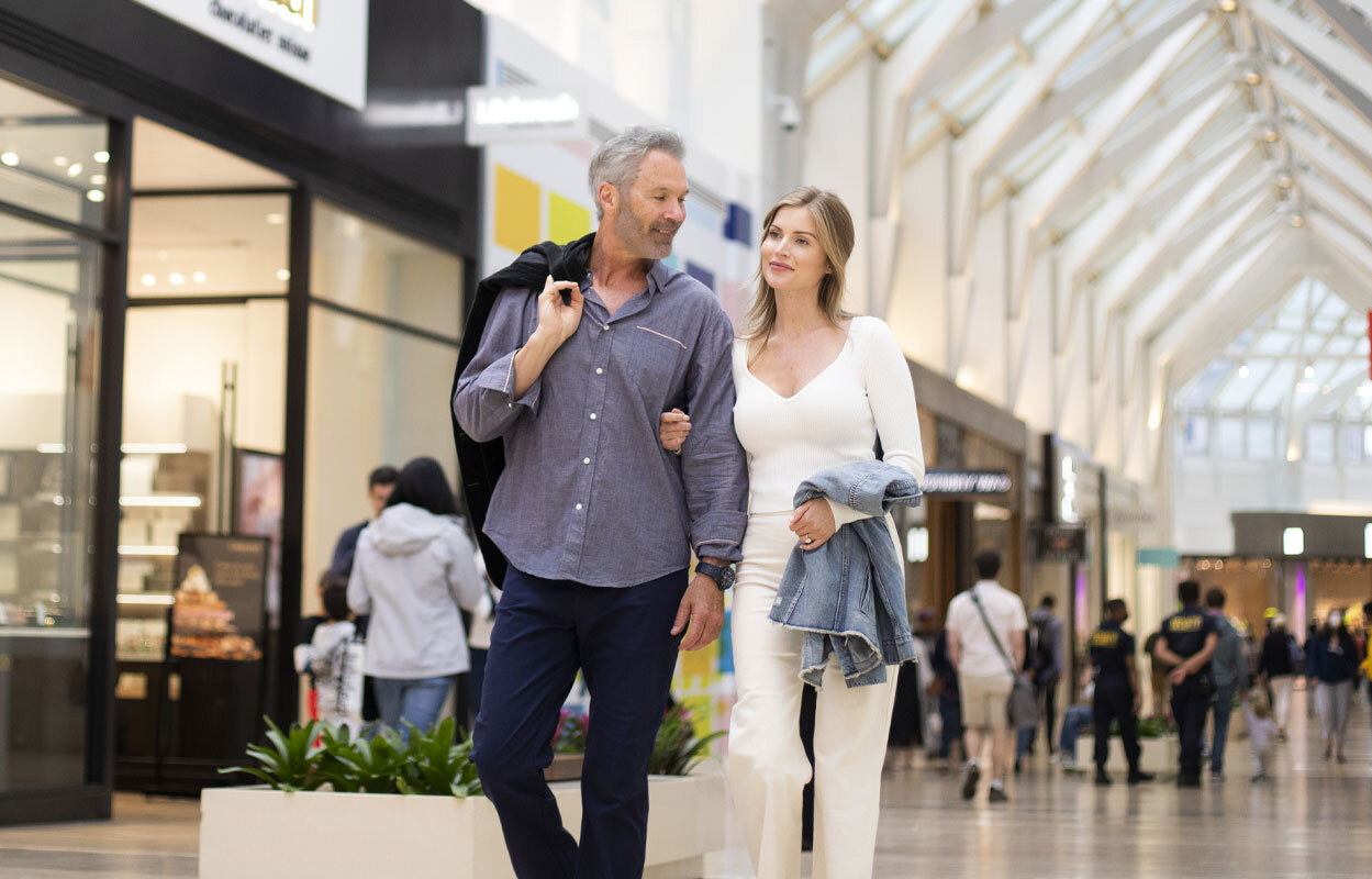 Couple walking in a mall