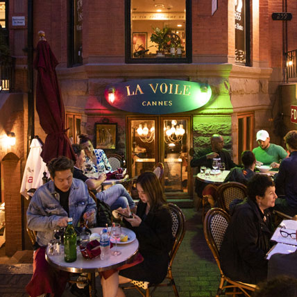 People eating at La Voile Brasserie