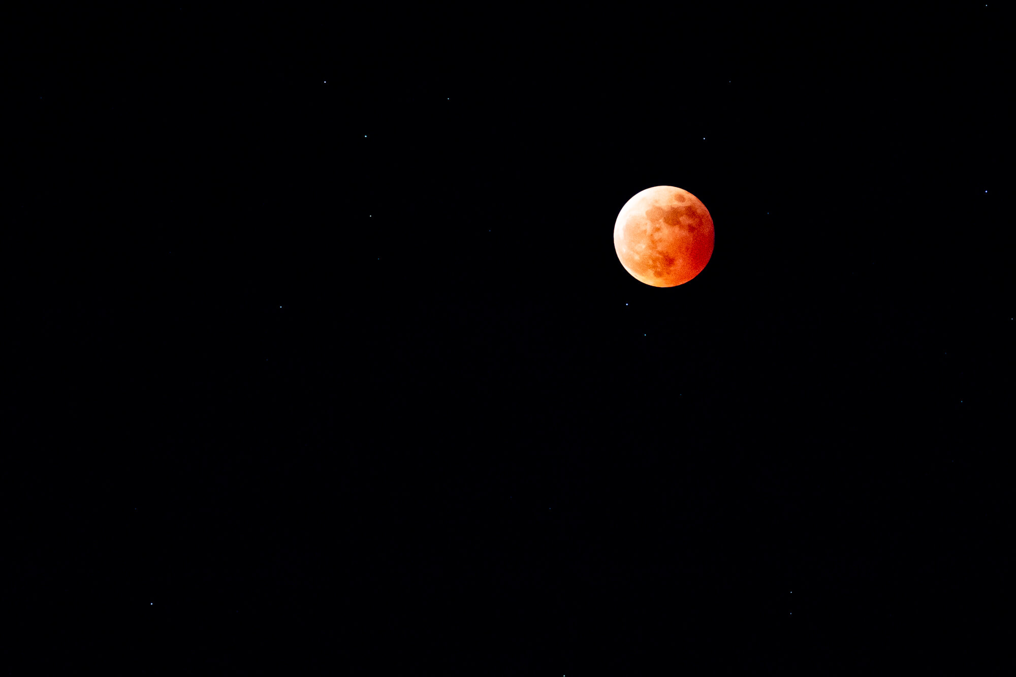 Why does the moon appear red?