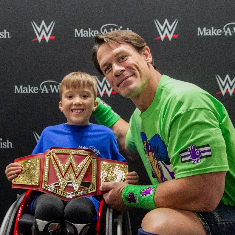 How is John Cena granting wishes to so many children?