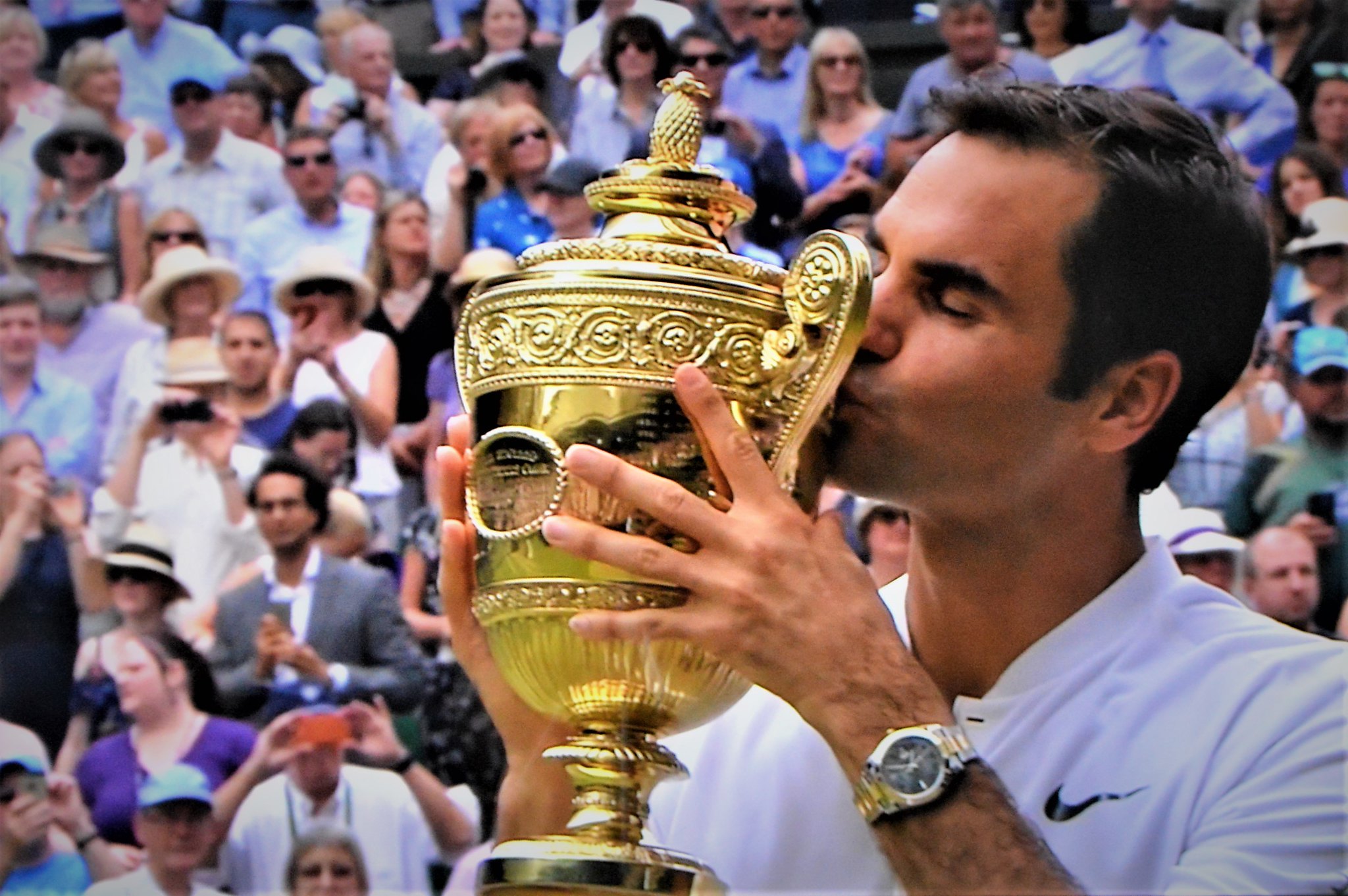 What are some of Federer's biggest records?