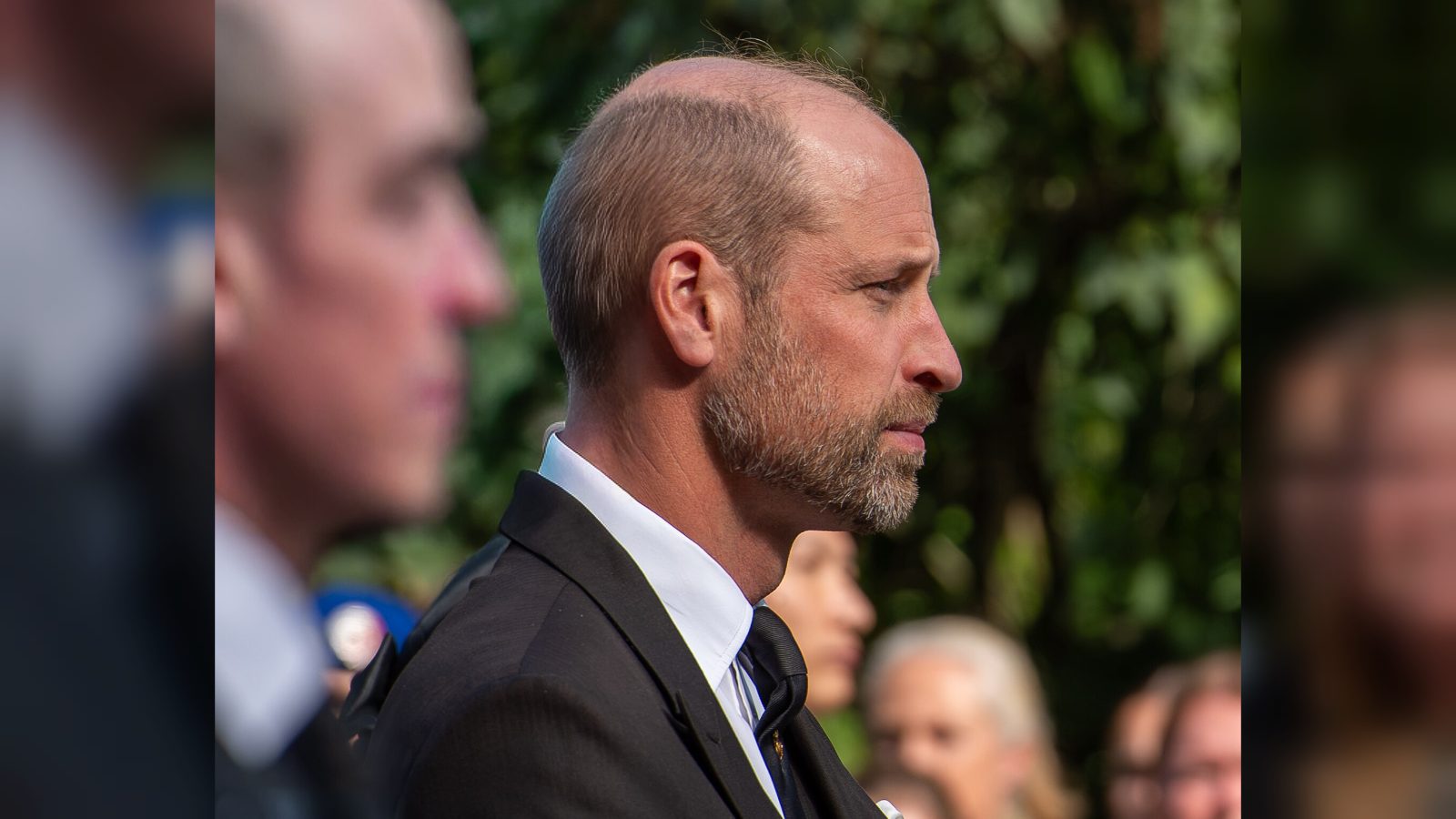 Prince William says flooding needs "holistic" approach as village damaged