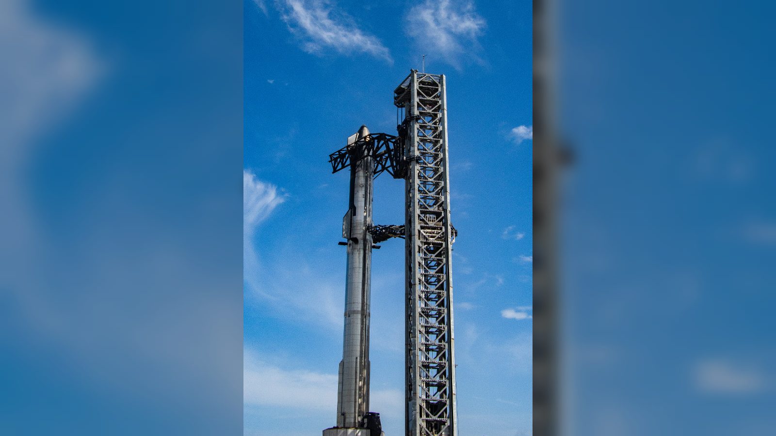SpaceX’s Super Heavy Booster Arrives at Pad Ahead of First Orbital Starship Launch