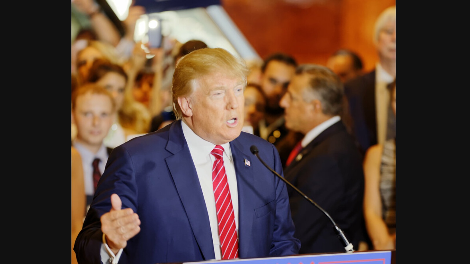 Trump says US strikes Iran "very hard" for killed soldiers