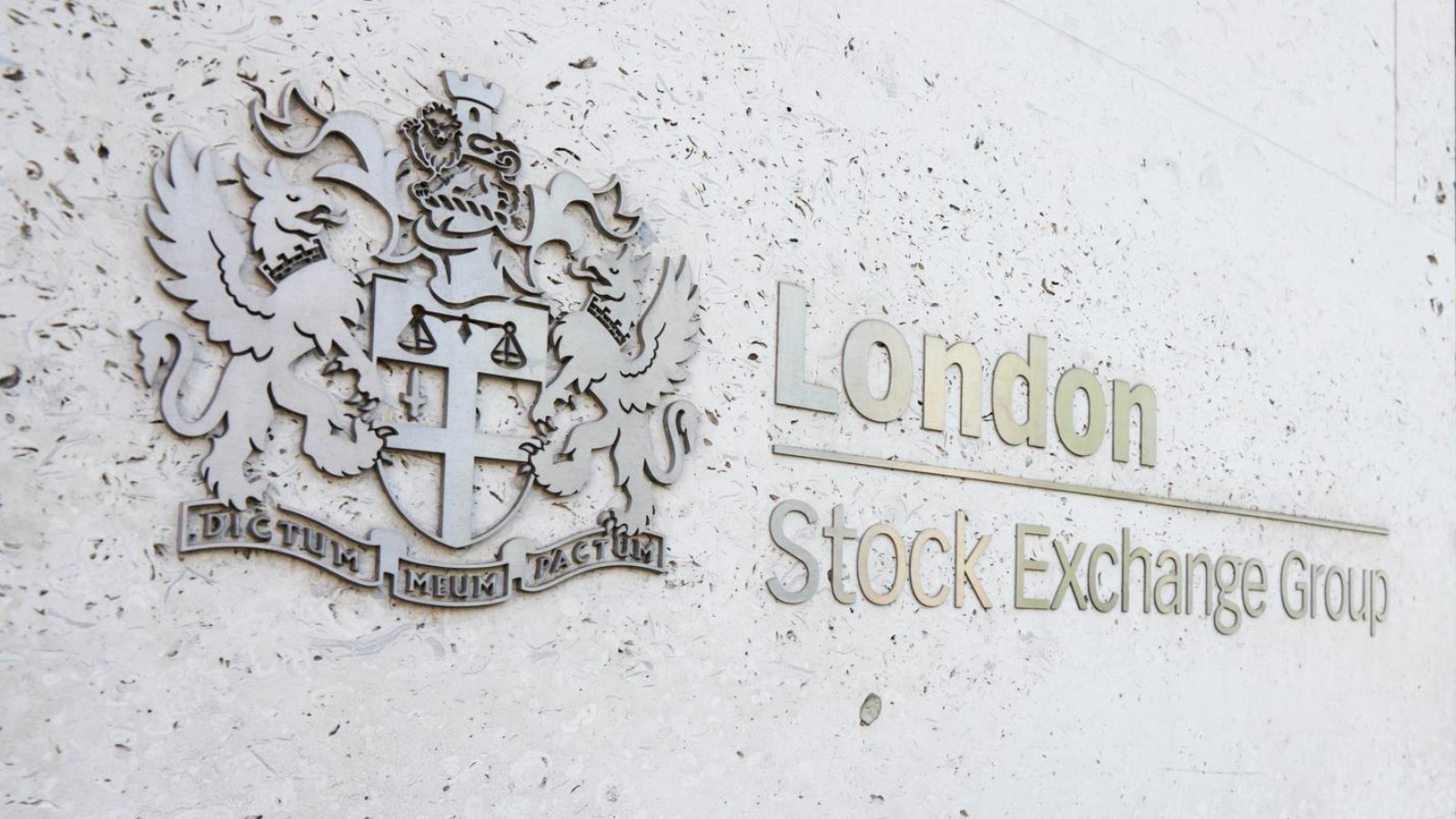 Britain's main stock markets climb slightly after hitting a one-month low