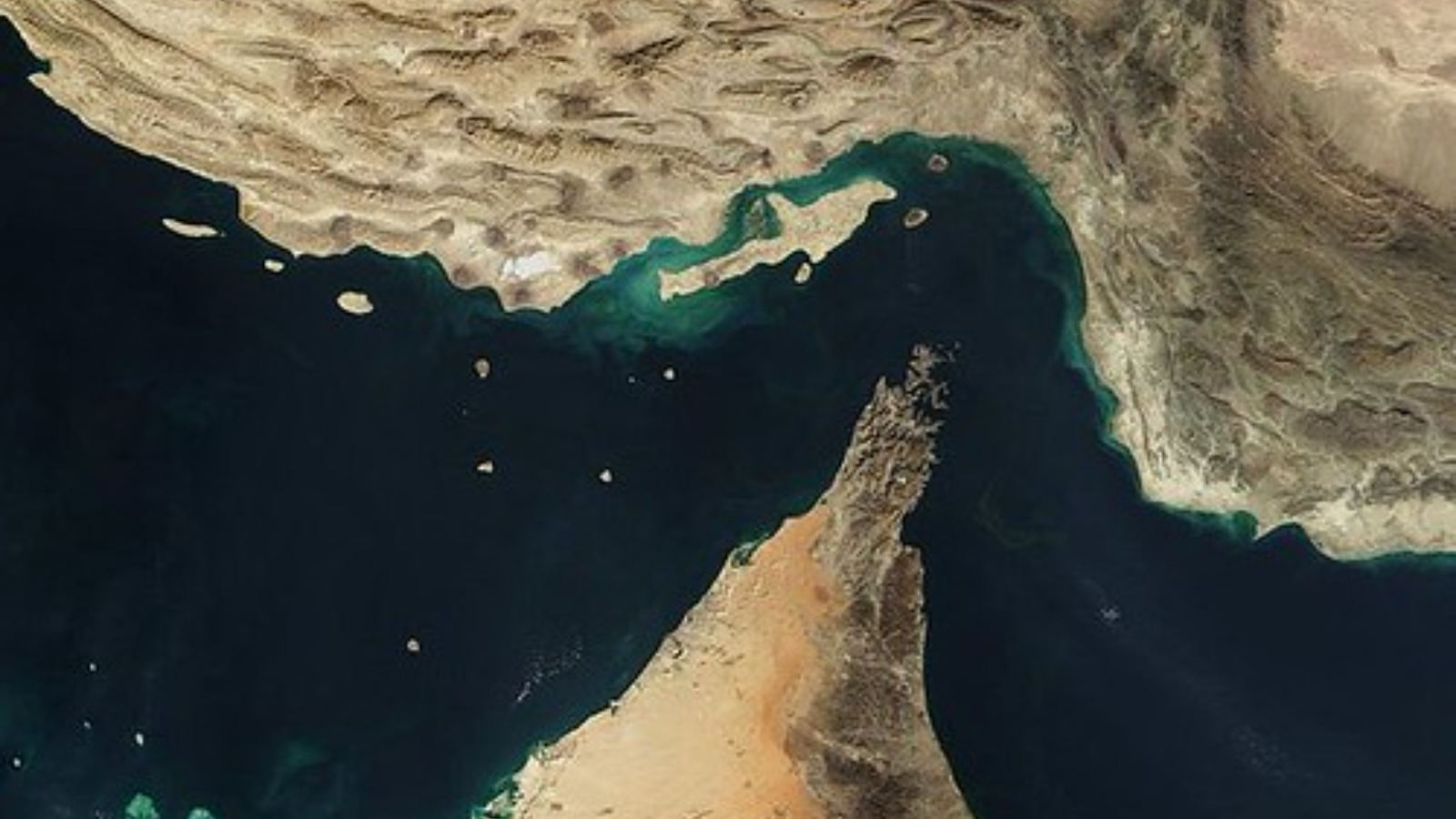 Projectiles strike two supertankers filled with Saudi crude leaving the Strait of Hormuz