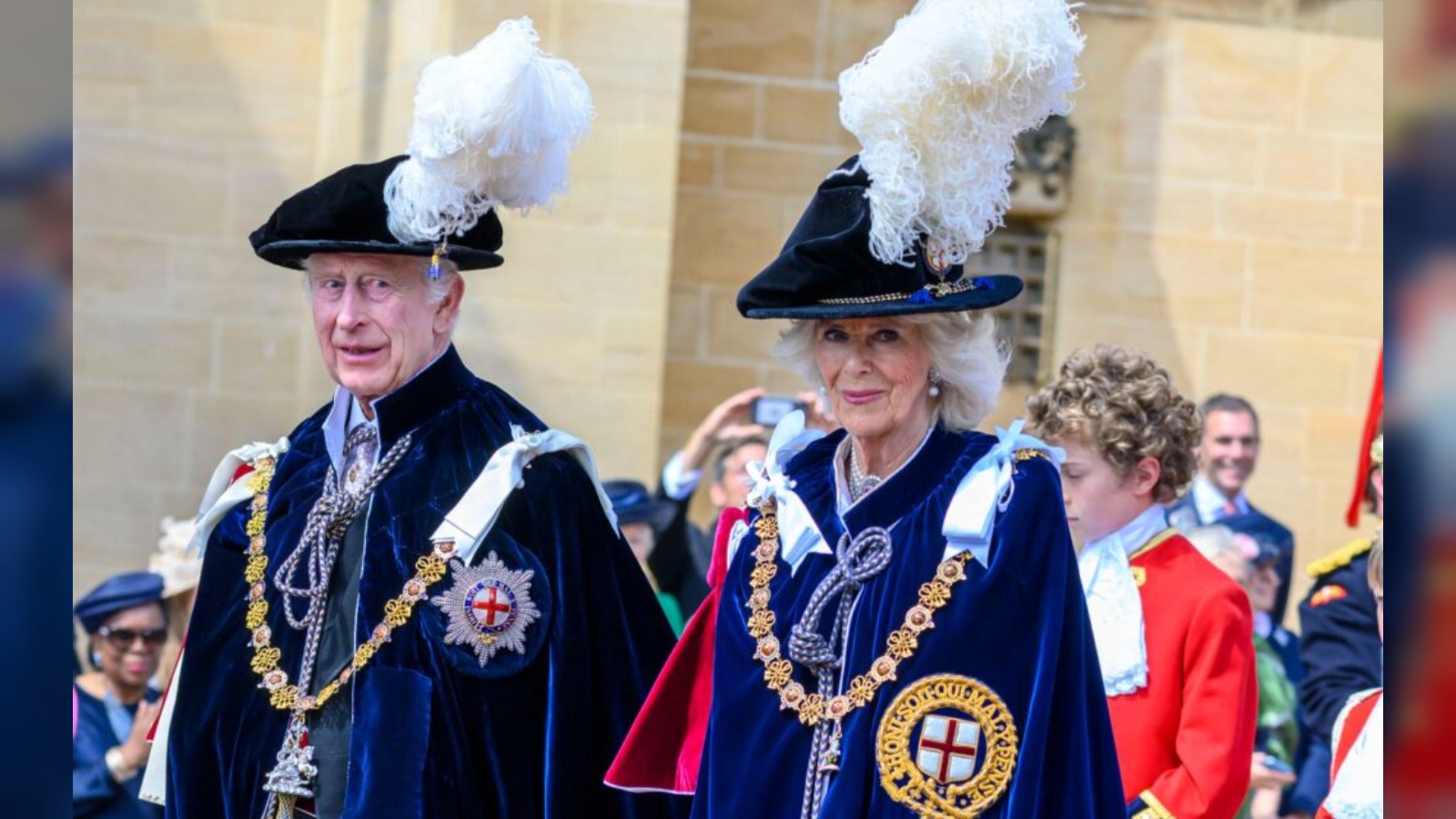 King and Queen watch Highland Games in Royal Deeside