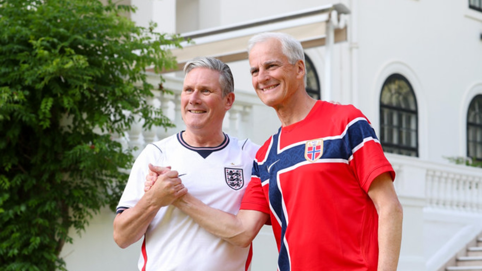 UK and Norway PMs wear football shirts before World Cup clash
