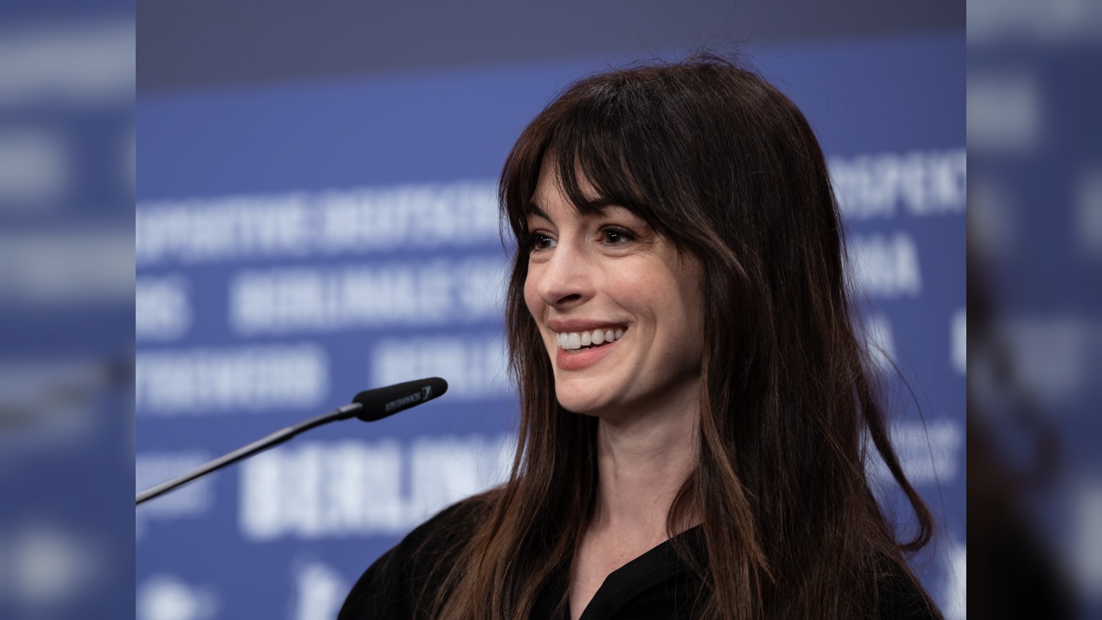 Anne Hathaway jokes about "fake baby bump" theories online