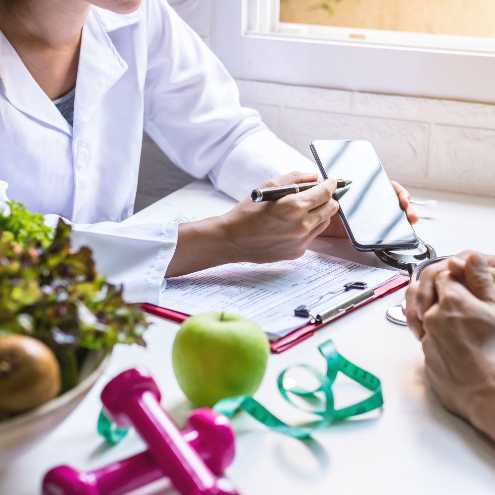 A provider reviewing a program plan with a client