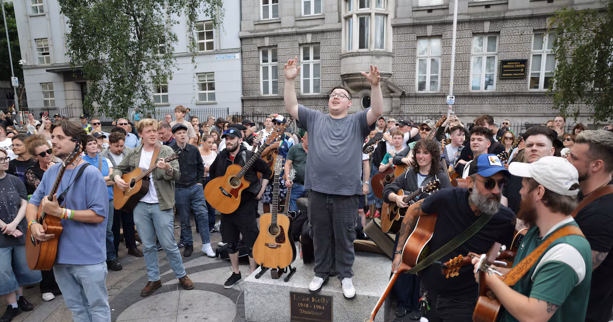 ‘It just feels like losing a friend’: Glen Hansard fans take to the street to sing and remember