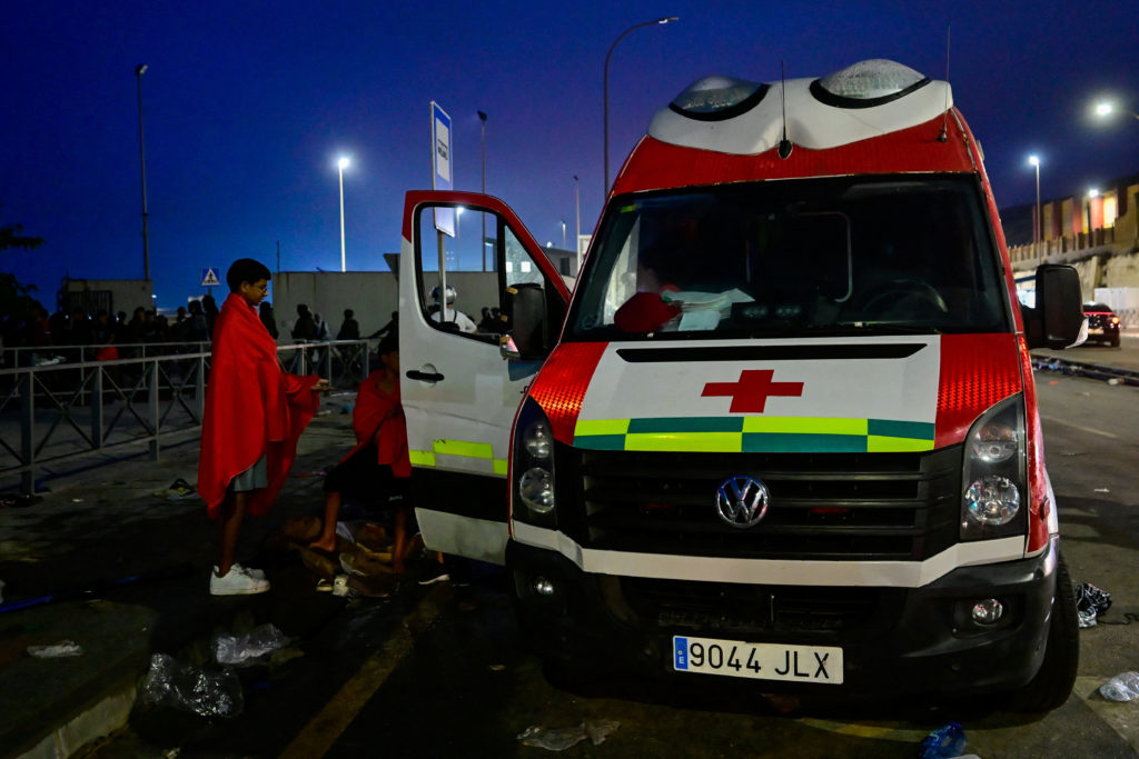 Thousands of migrants storm Ceuta border from Morocco