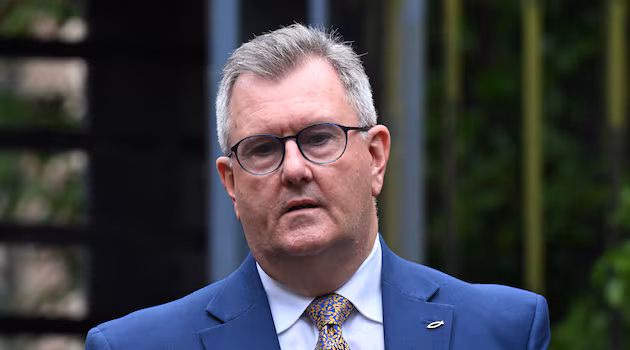 Woman charged over alleged breach of Jeffrey Donaldson victims’ anonymity