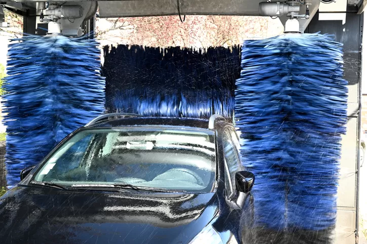 The True Cost of a Cheap Drive-Through Wash vs. Professional Car Detailing Near Me