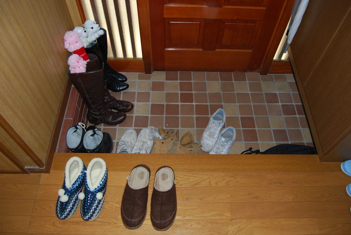 Genkan entrance with shoes placed neatly