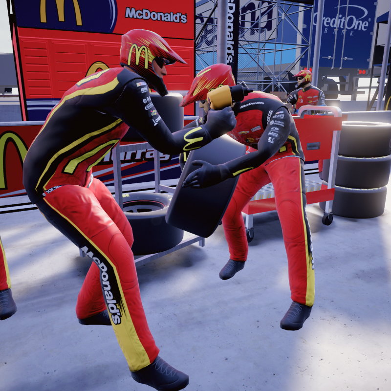 two 3d modeled pit crew members crouch in the ready position with wheel and bolt gun in hand