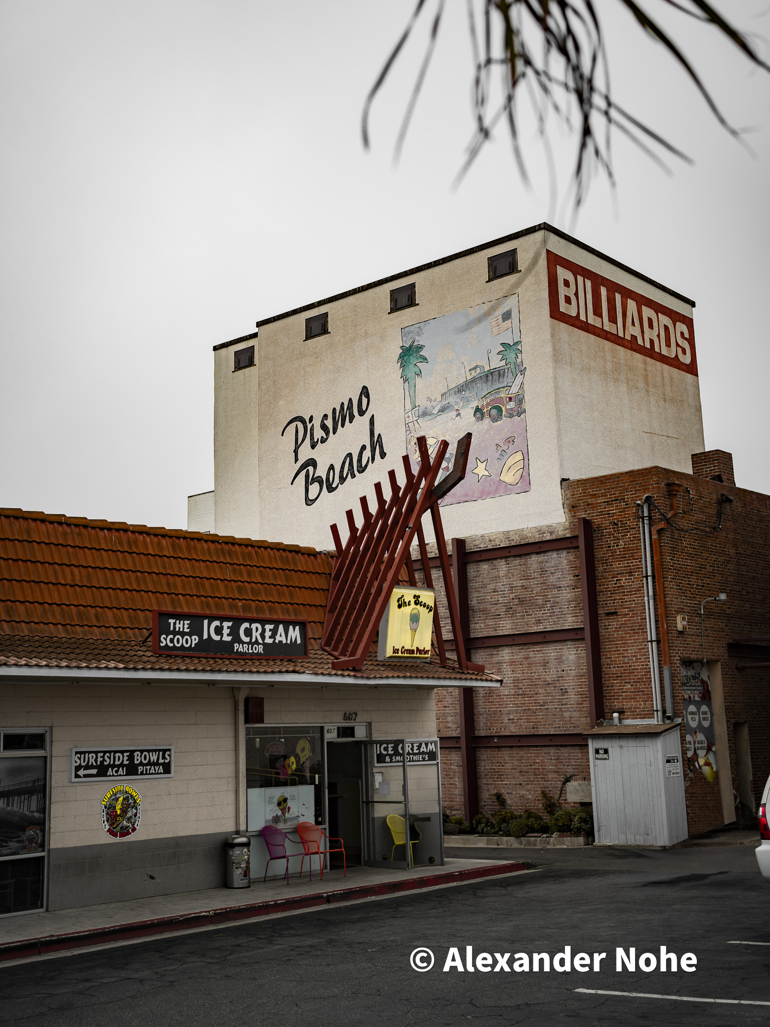 Exterior of The Scoop ice cream parlor with large mural