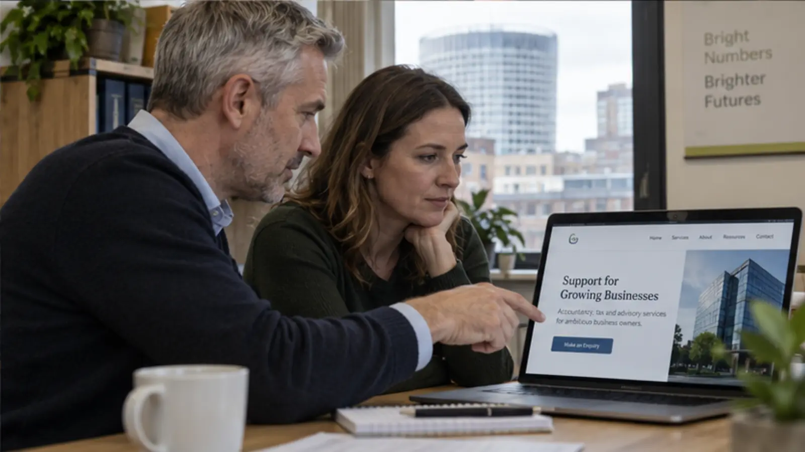 Birmingham accountant discussing a website with a small business client