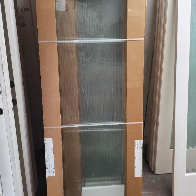 30" x 80" reeded glass.Door slab only