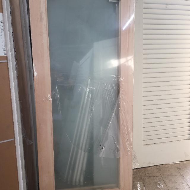 30" x 80"tall 1 lite exterior door with light wood frame