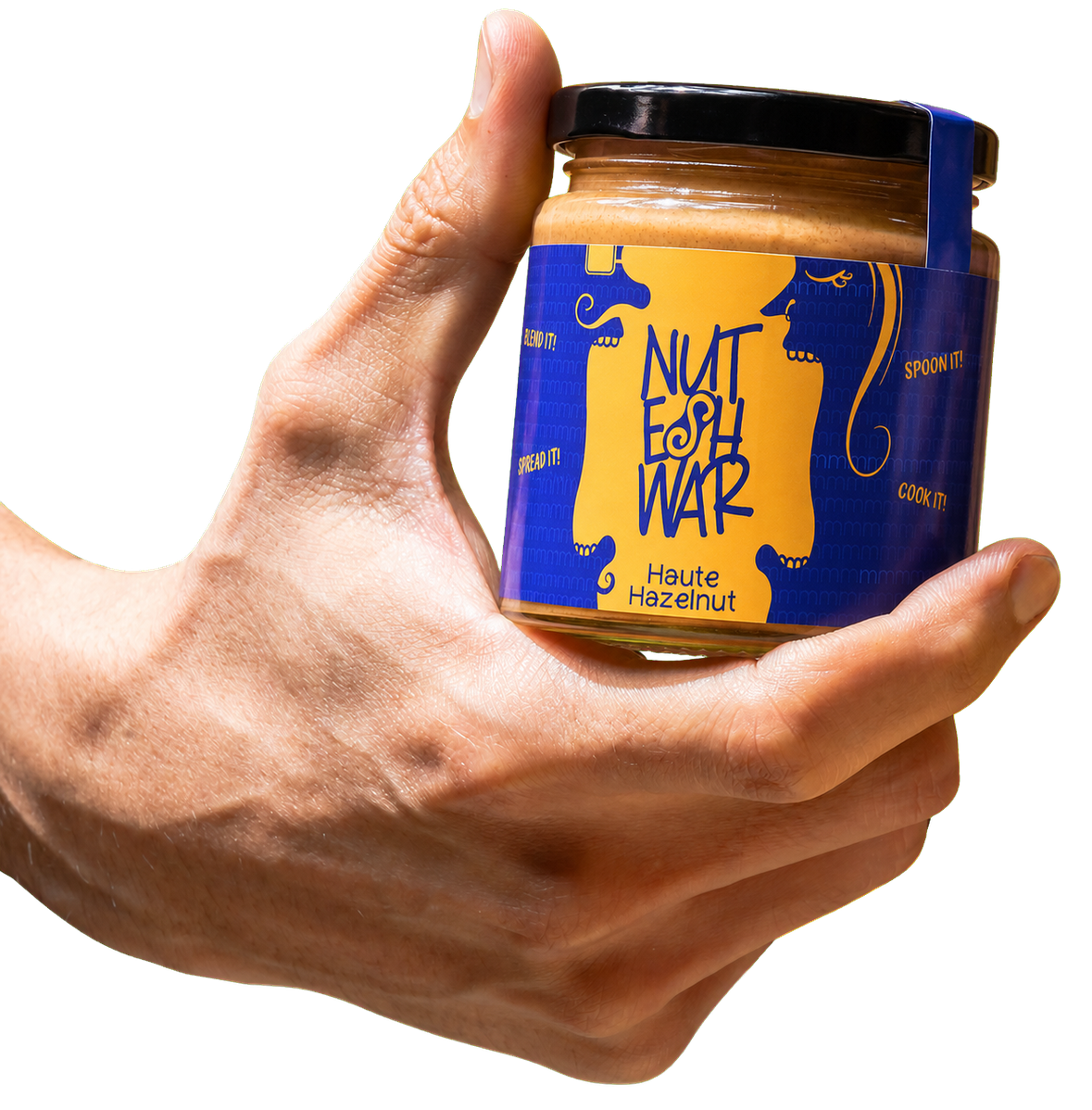 Hand holding a Haute Hazelnut jar