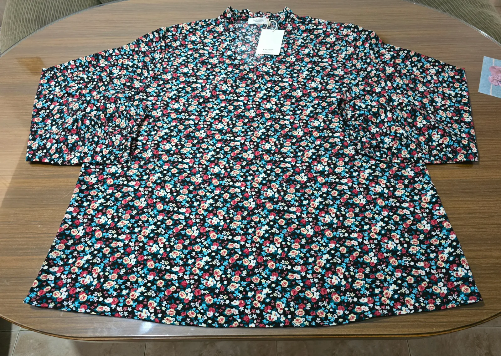 Blusa negra floral manga larga T.52 2