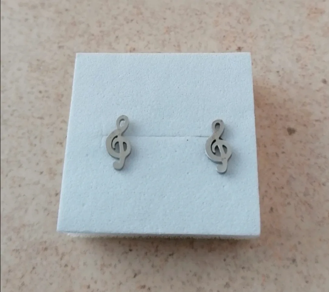 Pendientes clave de sol acero 1