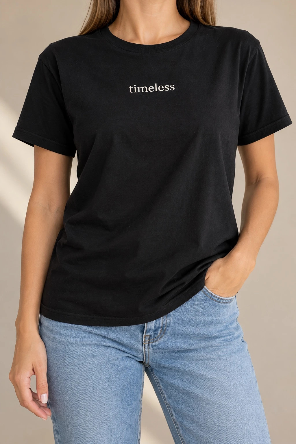Fekete „Timeless” feliratos női póló 1