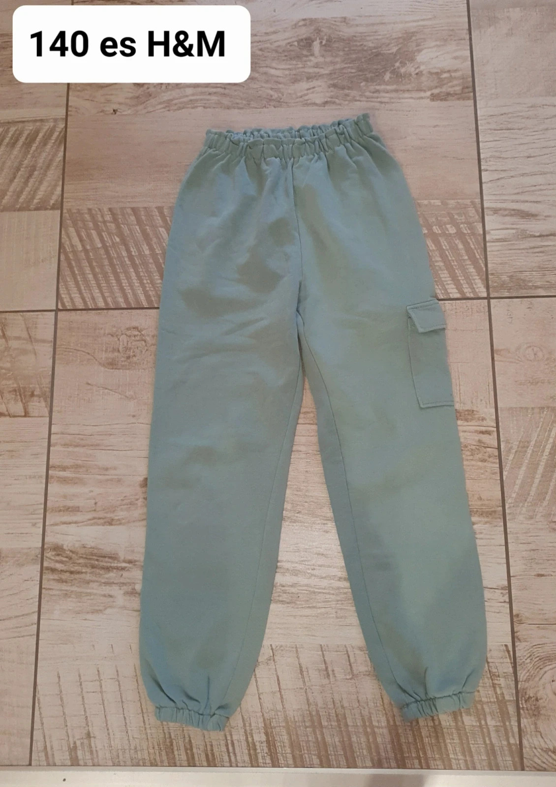 140 es H&M nadrág