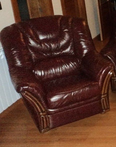 Leather armchair with wood