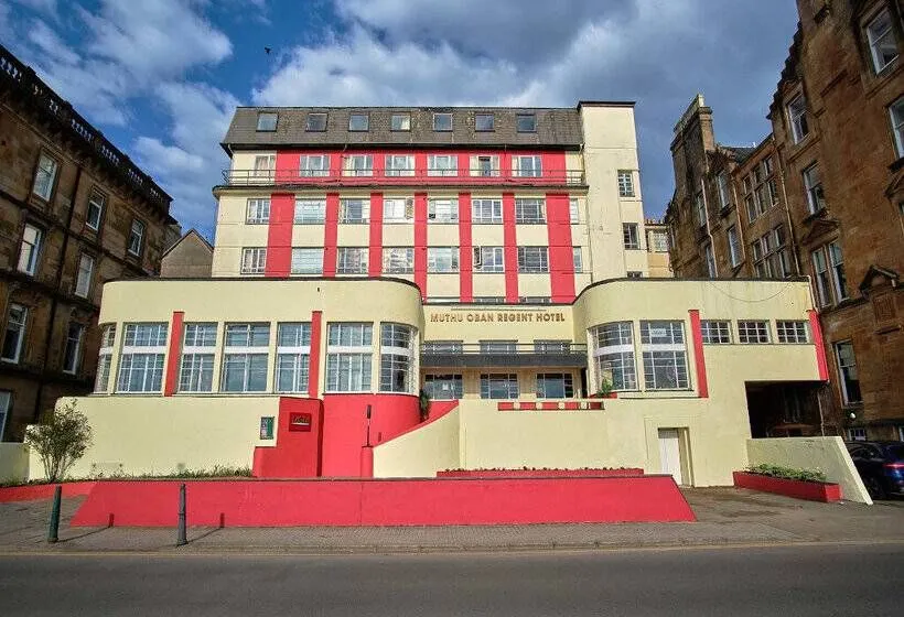 The image effectively captures the Muthu Oban Regent Hotel with strong composition and good lighting. Its sharpness and color accuracy contribute to a realistic depiction, though the sky lacks strong visual interest.