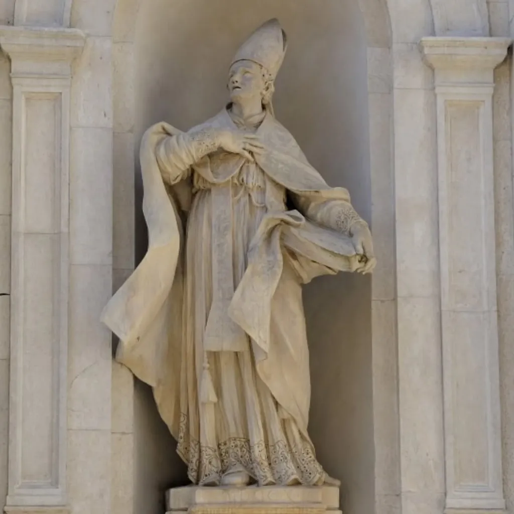 A well-composed and sharply focused photograph of a classical marble statue within a niche. The lighting is excellent, highlighting the intricate details of the sculpture, and the colors are accurate.