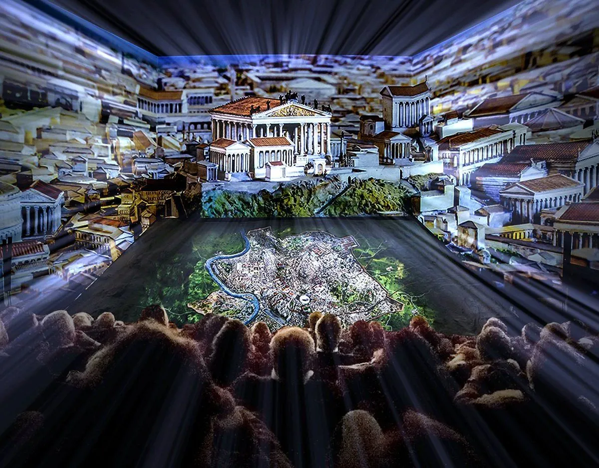 The image captures an engaging and well-composed historical exhibit. The lighting is dramatic and effective, highlighting the central architectural model and projected map of ancient Rome. Key elements of the exhibit are sharp and appear color-accurate, contributing to a strong sense of photo-realism for the captured scene. While the foreground audience is darker and less in focus, it supports the immersive nature of the display without detracting from the main subject.