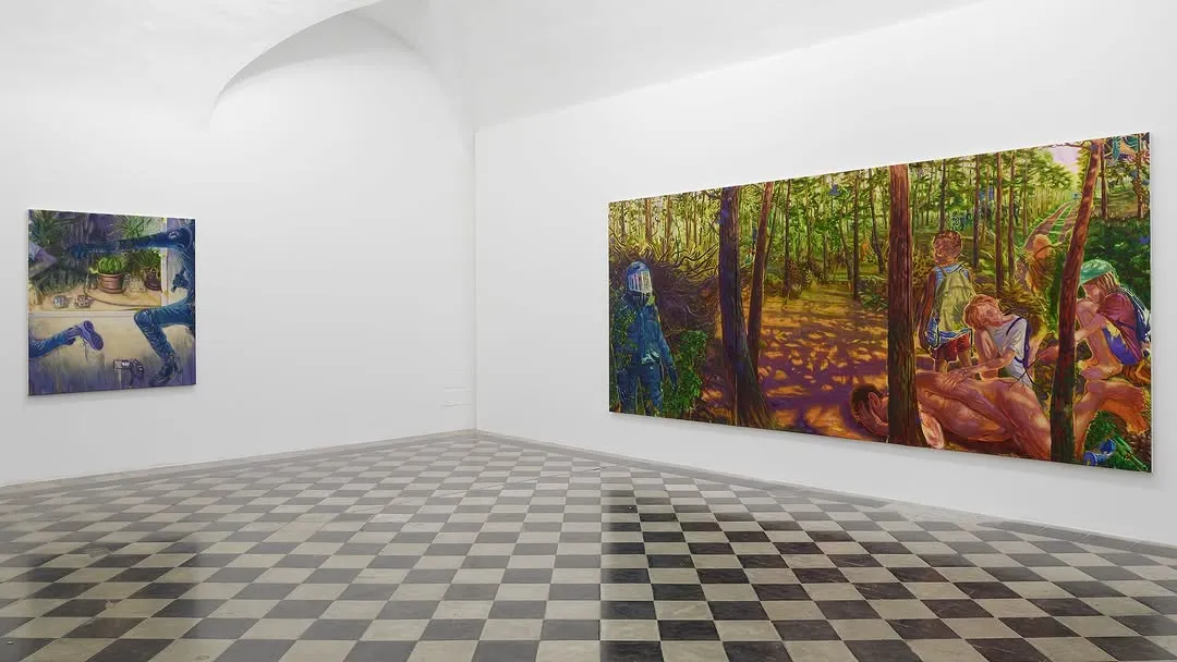 An interior shot of a minimalist art gallery featuring a large, vibrant painting on a white wall, set against a black and white checkered floor.