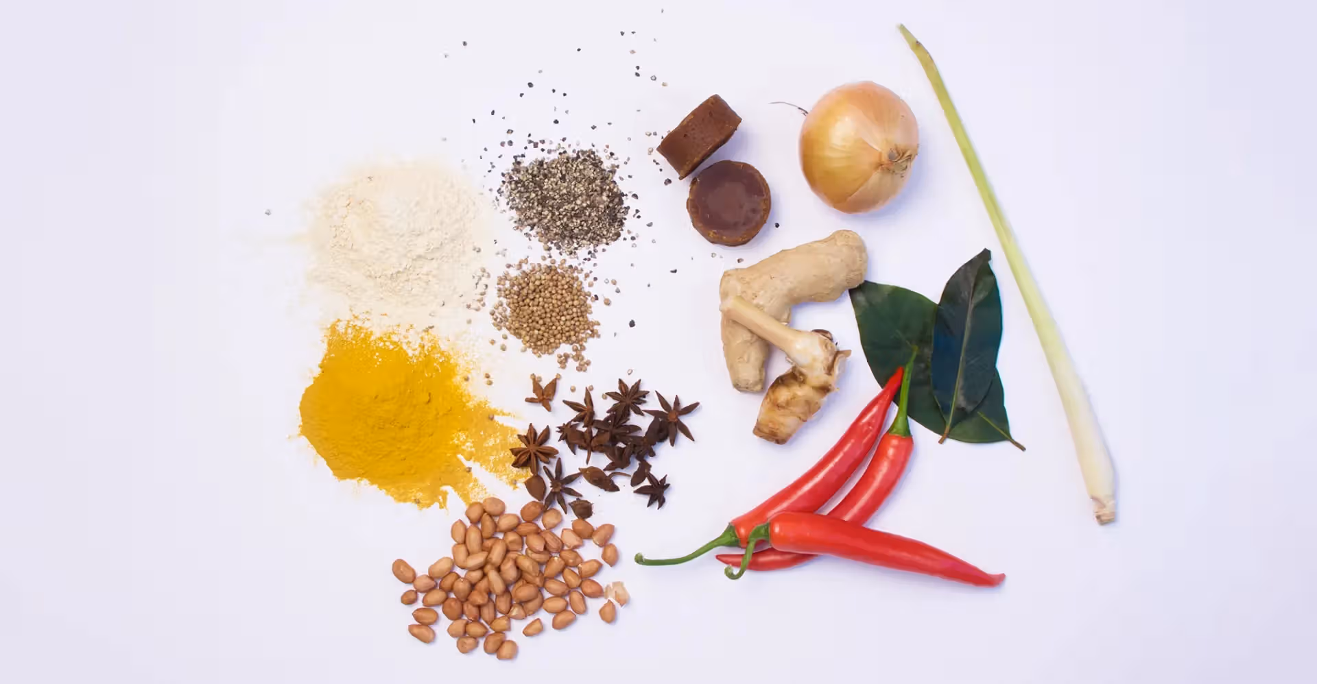 The image presents a well-composed and lit arrangement of various spices and cooking ingredients on a white background. The colors are accurate and vibrant, making the ingredients visually appealing. The image is sharp, and the key elements are in focus. It appears to be a professionally taken shot. The photo-realism is high, accurately representing the textures and colors of the ingredients. The composition is well-balanced, and the arrangement is aesthetically pleasing. Strengths: Well-lit, sharp, color-accurate, and photo-realistic. Weaknesses: None apparent.