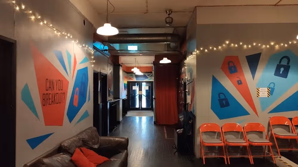 The image shows a hallway interior. The composition is adequate, but the lighting is somewhat uneven. The image is reasonably sharp, but not exceptionally so. Color accuracy seems acceptable. It is not particularly photo-realistic. Key elements are mostly in focus, but the overall impression is somewhat bland. The hallway is a little cluttered, which detracts from the overall quality. The image could benefit from better lighting and a clearer focal point.