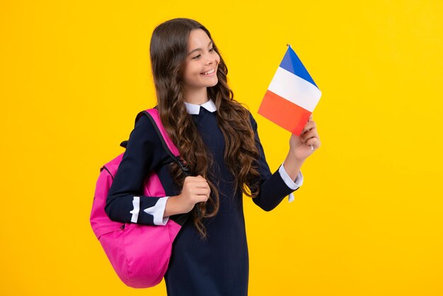 Student learning French with a book