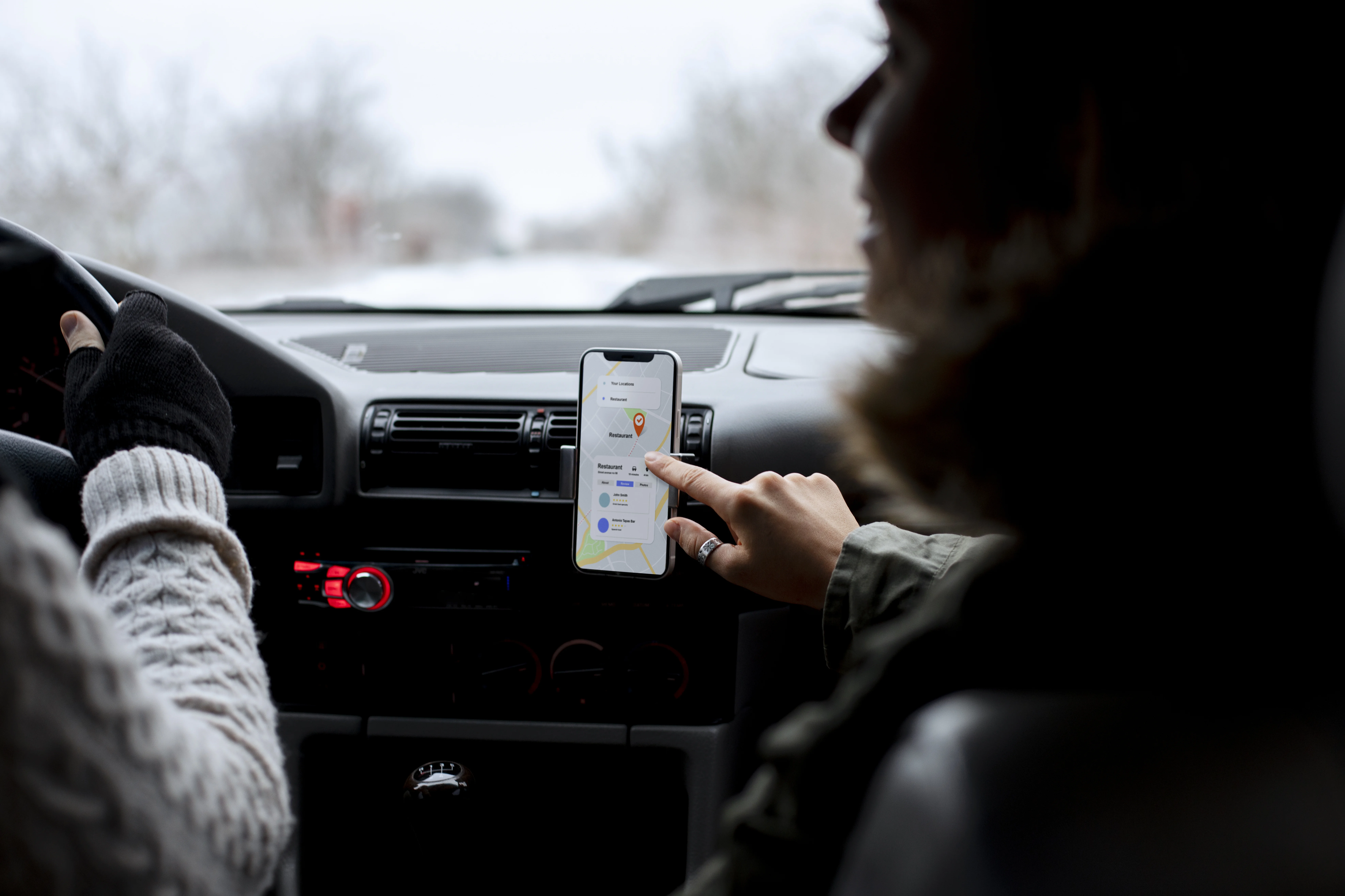 People using GPS in car