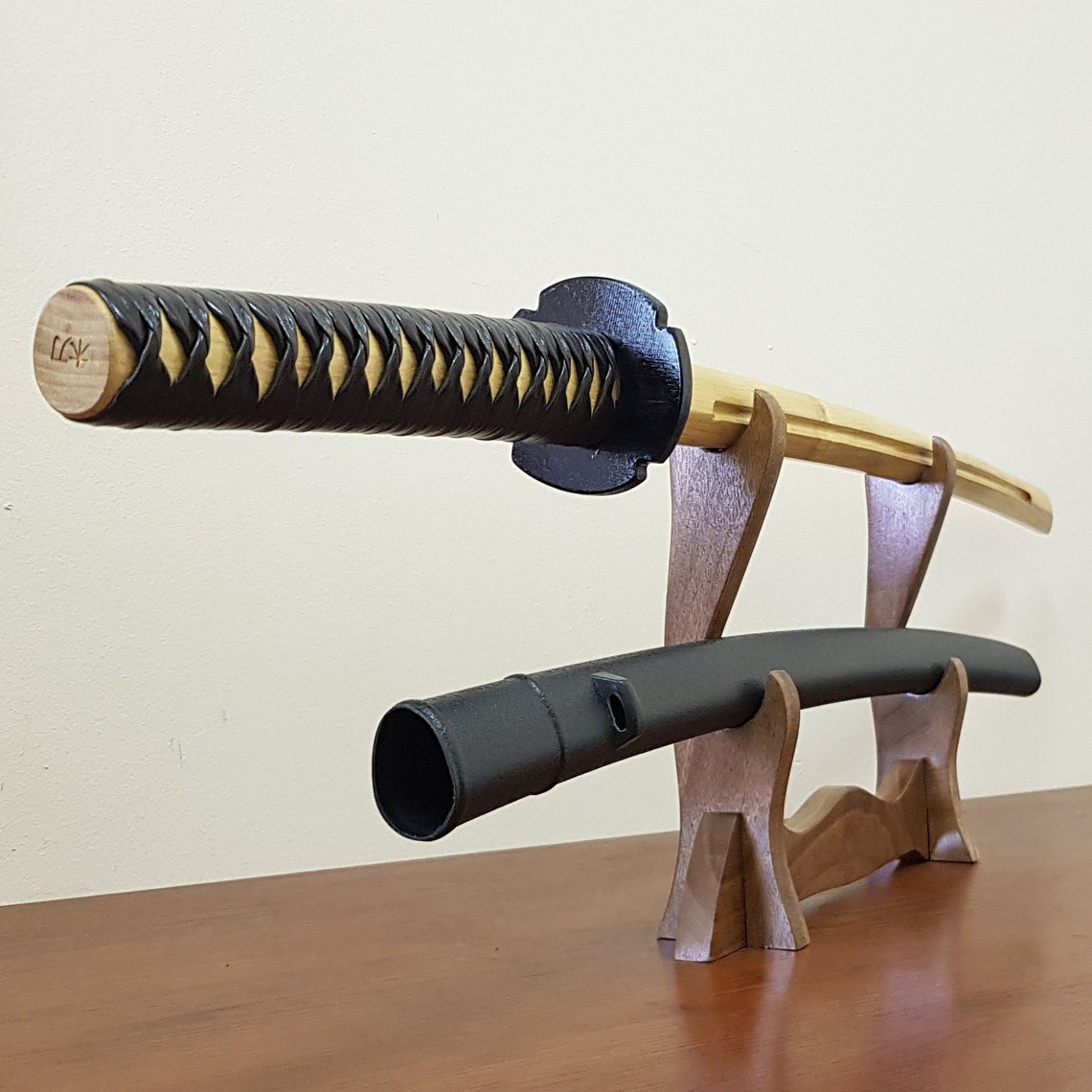 Bokken Daito 102 cm, robinia, tsuba, plastic saya, tsukamaki handle braid, and blood groove