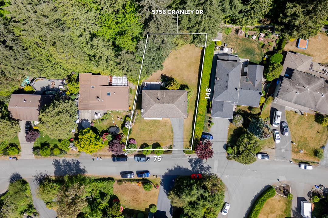 Annotated aerial drone shot in Horseshoe Bay showing the property boundary outlined in white with lot dimensions of 75 by 148 feet labelled for buyer clarity.