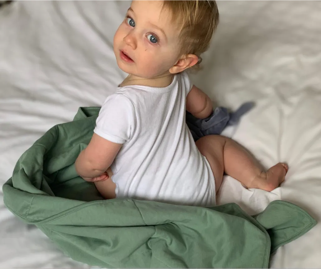 Image of an excited Baby care On Me gift card recipient. Their thank you note is below.
