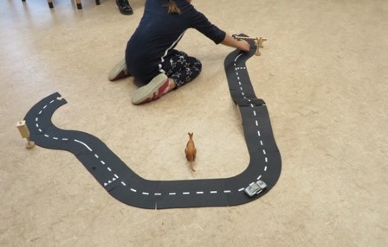 Voorbeeld van Zingend over het verkeerscircuit