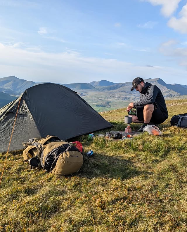A tent pitched on the summit of Moel Hebog in Snowdonia, Wales.