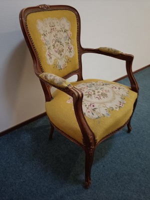 Yellow needlepoint chair