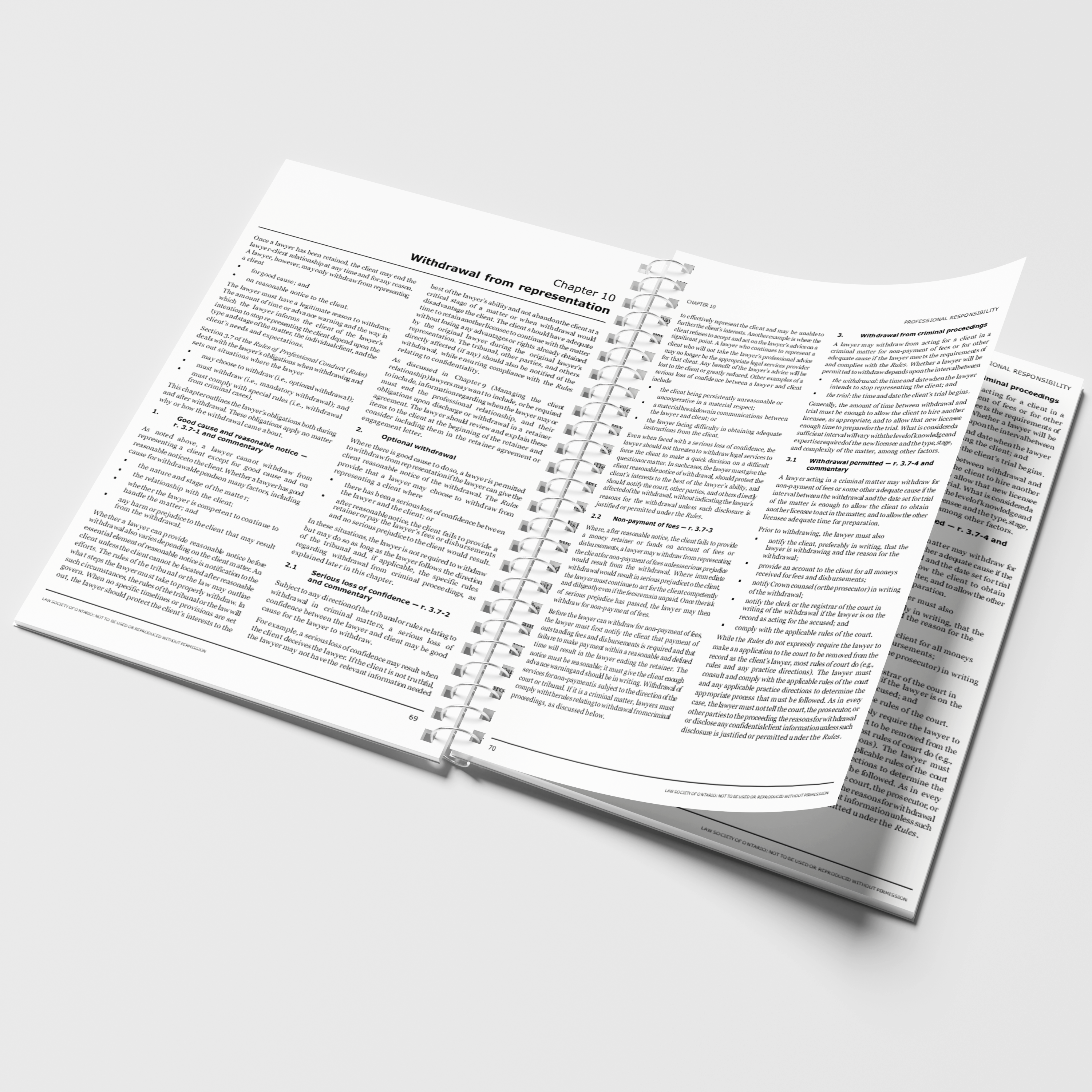 Spiral-bound bar exam materials open on a desk