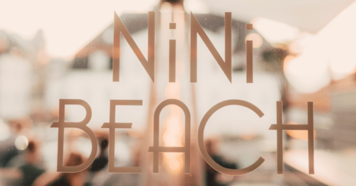 Ugly Christmas Sweater w/Lona at NiNi Beach