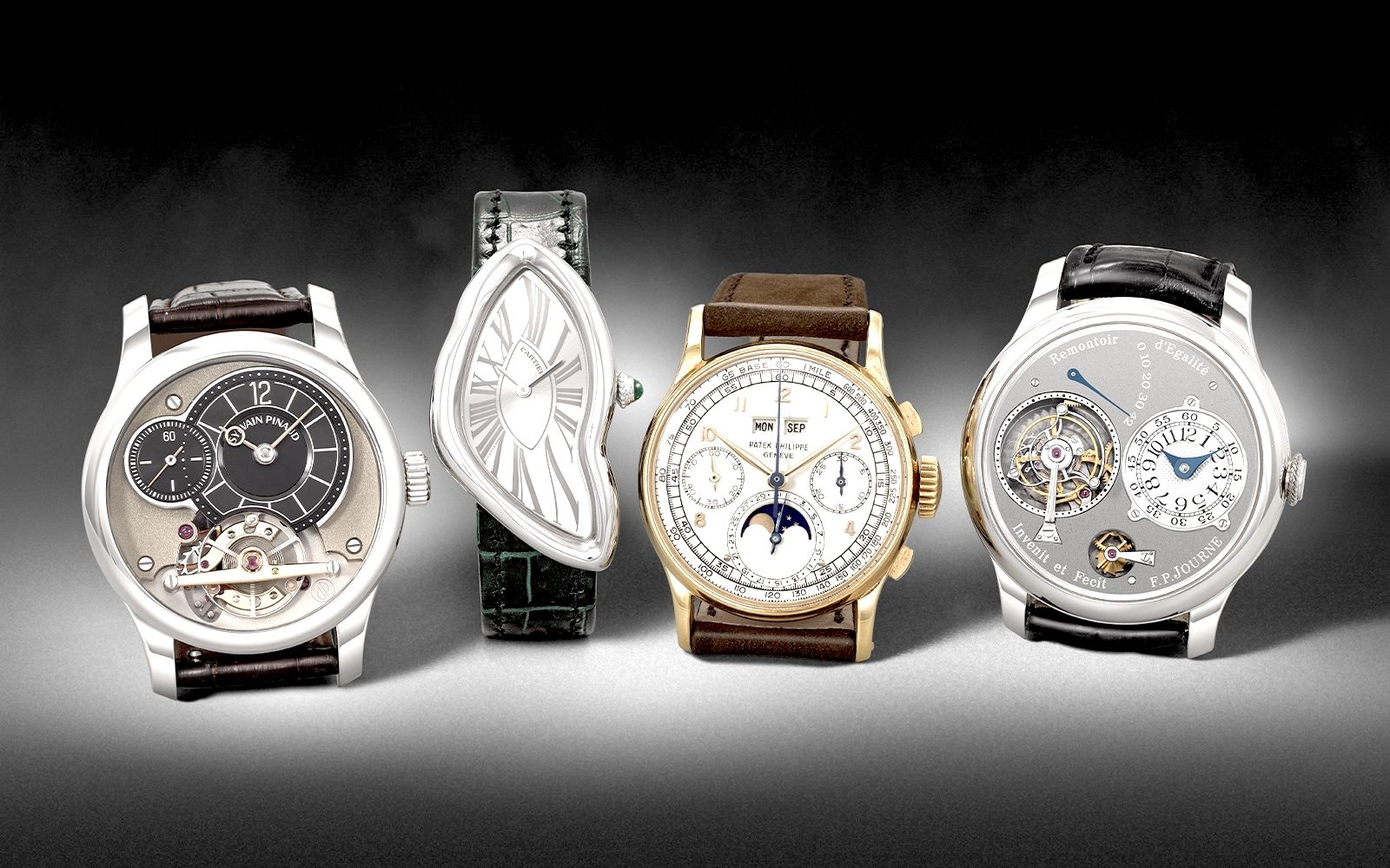 Black-and-white photograph of three luxury wristwatches on a dark surface, including a melted-form dress watch and a moonphase chronograph.